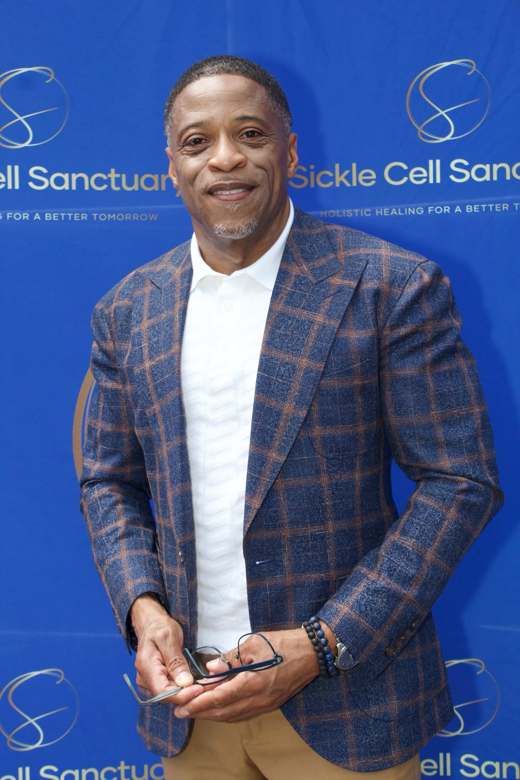 Business professional photographed at a Sickle Cell Sanctuary event