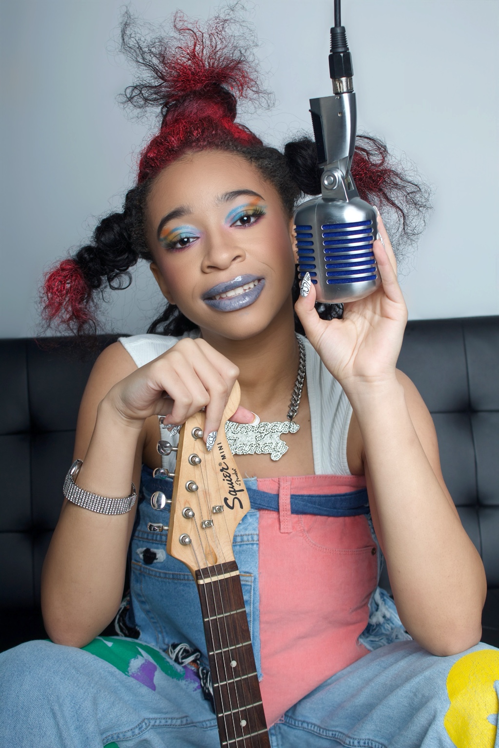 Creative portrait by Ki Shot It Visuals of a musician with a guitar and microphone