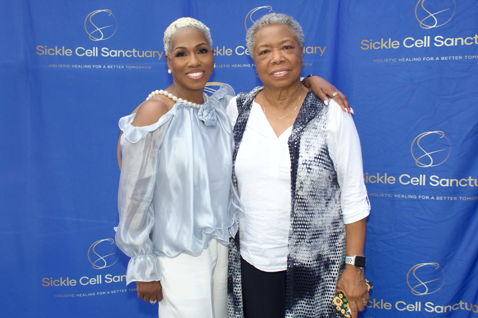 Two guests at a Sickle Cell Sanctuary event